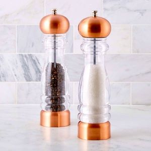 Crate&Barrel copper salt and pepper mills. New